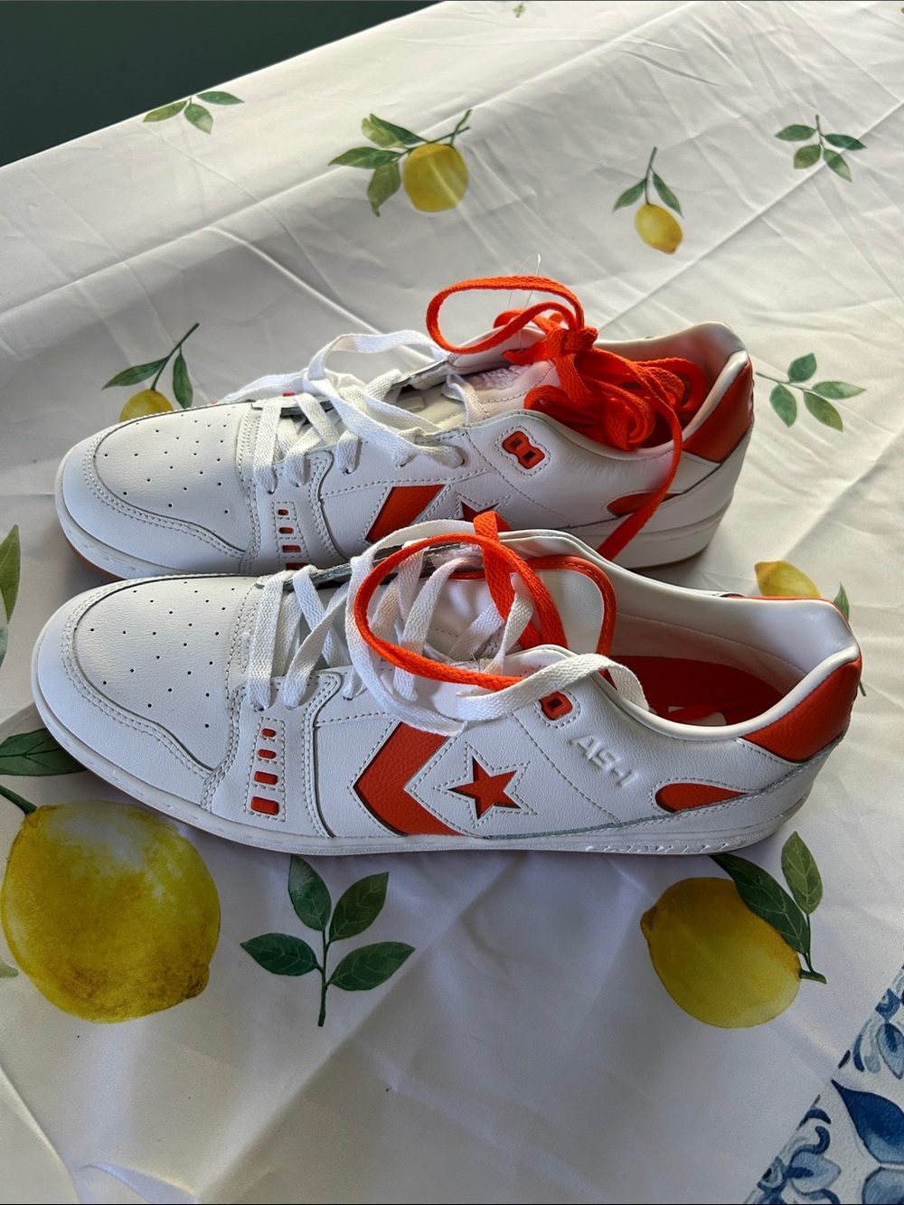 Men’s size 12 NEW White ConverseSneakers with Vibrant Orange Accents